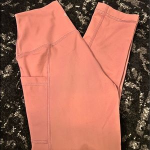 light pink leggings by 90°, size xs, with pockets.